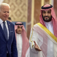 Saudi Crown Prince Mohammed bin Salman, right, welcomes US President Joe Biden to Al-Salam Palace in Jeddah, Saudi Arabia, July 15, 2022. (Bandar Aljaloud/Saudi Royal Palace via AP, File)