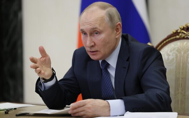 Russian President Vladimir Putin gestures while speaking in Moscow, Russia, Dec. 7, 2022. (Mikhail Metzel, Sputnik, Kremlin Pool Photo via AP)