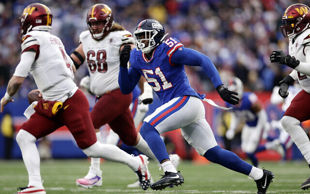 Illustrative: New York Giants linebacker Azeez Ojulari (51) defends against the Washington Commanders during an NFL football game, December 4, 2022, in East Rutherford, New Jersey. (AP Photo/Adam Hunger)