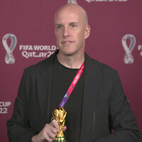 A screenshot taken from video provided by FIFA of journalist Grant Wahl at an awards ceremony in Doha, Qatar in Nov. 2022. Wahl, one of the most well-known soccer writers in the United States, died Dec. 10, 2022 while covering the World Cup match between Argentina and the Netherlands. (FIFA via AP)