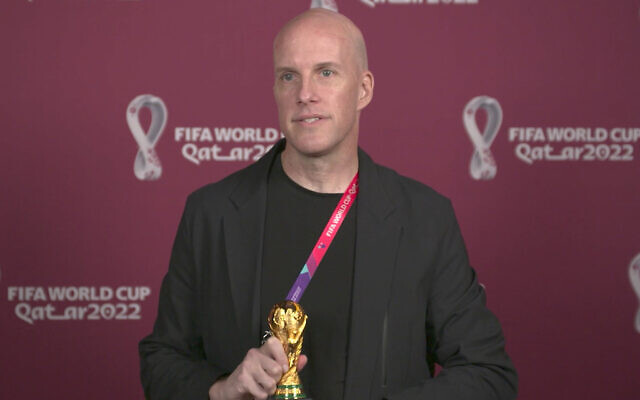 A screenshot taken from video provided by FIFA of journalist Grant Wahl at an awards ceremony in Doha, Qatar in Nov. 2022. Wahl, one of the most well-known soccer writers in the United States, died Dec. 10, 2022 while covering the World Cup match between Argentina and the Netherlands. (FIFA via AP)
