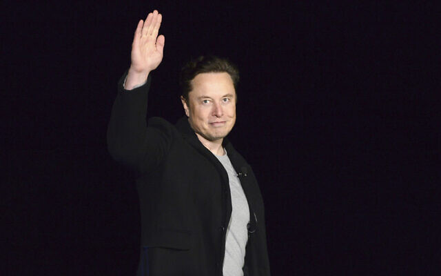 Elon Musk waves on February 10, 2022, near Brownsville, Texas. (Miguel Roberts/The Brownsville Herald via AP)