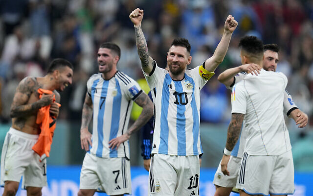 Argentina's Lionel Messi celebrates defeating Croatia 3-0 in a World Cup semifinal soccer match at the Lusail Stadium in Lusail, Qatar, Dec. 13, 2022. (AP Photo/Natacha Pisarenko)
