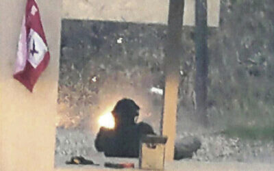 This photo taken November 11, 2022, by the FBI in an affidavit filed to the United State District Court of Minnesota shows River William Smith at a gun club in Prior Lake, Minnesota. (FBI via AP)