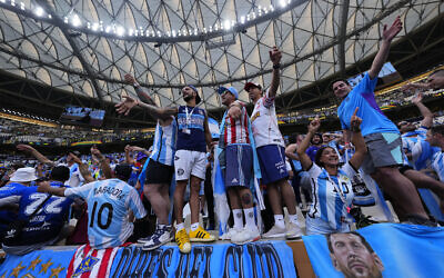 Argentinian fans cheer before the the World Cup final soccer match between Argentina and France at the Lusail Stadium in Lusail, Qatar, Sunday, Dec. 18, 2022. (AP/Petr David Josek)
