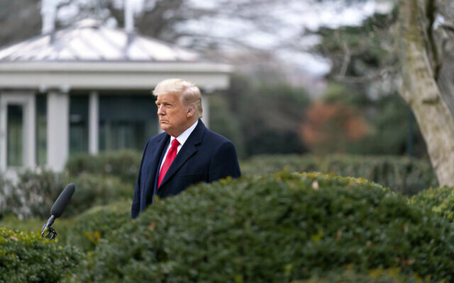 Then-president Donald Trump recording a video statement in an effort to get rioters at the US capitol to disperse, on the afternoon of January 6, 2021, from the Rose Garden of the White House in Washington, DC. (House Select Committee via AP)