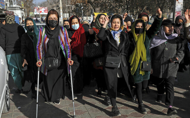 Afghan women chant slogans during a protest against the ban on university education for women, in Kabul, Afghanistan, Dec. 22, 2022. (AP Photo)