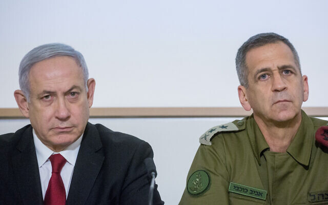 FILE: Prime Minister Benjamin Netanyahu and IDF Chief of Staff Aviv Kohavi at a press conference after a security cabinet meeting following the escalation of violence in the Gaza Strip, at IDF headquarters in Tel Aviv, on November 12, 2019. (Miriam Alster/Flash90)
