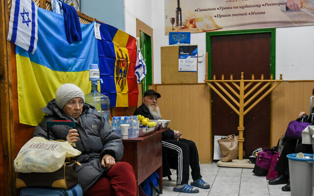Jewish Ukrainian who fled war zones in Ukraine wait to receive their entry papers to Israel, at an emergency shelter in Chisinau, Moldova, March 15, 2022. (Yossi Zeliger/Flash90)