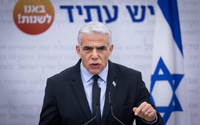 Outgoing Prime Minister Yair Lapid speaks during a faction meeting at the Knesset in Jerusalem, on November 21, 2022. (Yonatan Sindel/Flash90)