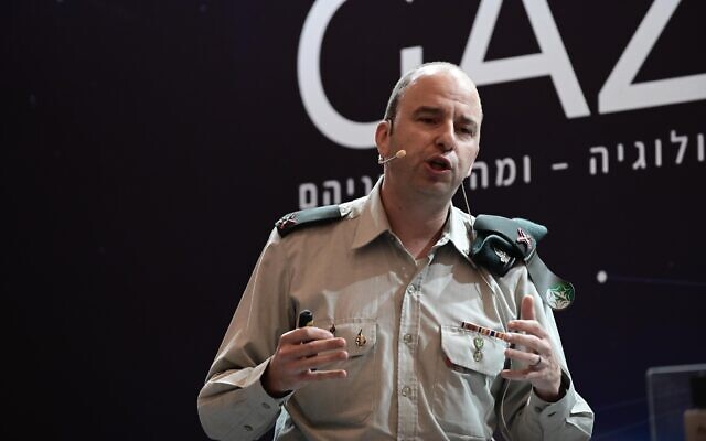 Brig. Gen. Amit Saar, head of the Military Intelligence research department, speaks at a Gazit conference in Tel Aviv, December 5, 2022. (Tomer Neuberg/Flash90)