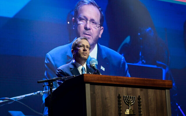 Israeli President Isaac Herzog speaks at a gathering in Tel Aviv, December 13, 2022. (Avshalom Sassoni/Flash90)