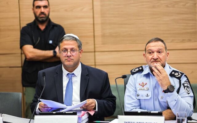 MK Itamar Ben Gvir, left, and Israel Police Commissioner Kobi Shabtai attend a special committee meeting at the Knesset in Jerusalem, on December 14, 2022. (Yonatan Sindel/Flash90)