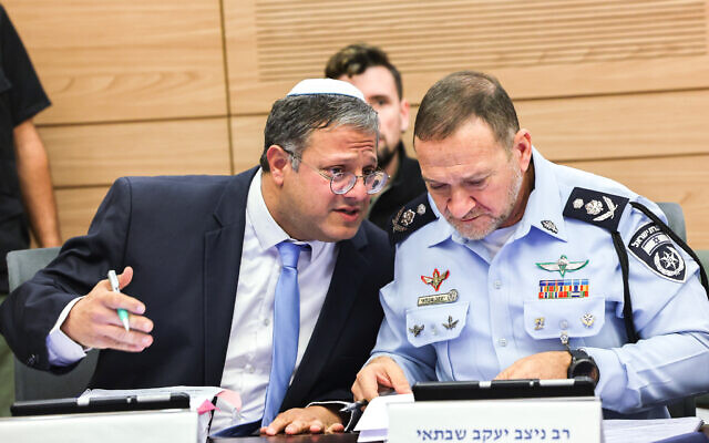 MK Itamar Ben Gvir (l) and Chief of Police Kobi Shabtai attend an Arrangements Committee meeting at the Knesset in Jerusalem, on December 14, 2022. (Yonatan Sindel/Flash90)