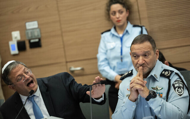 Otzma Yehudit chief Itamar Ben Gvir and Police Commissioner Kobi Shabtai at a special committee in the Knesset in Jerusalem, December 14, 2022.  (Yonatan Sindel/Flash90)
