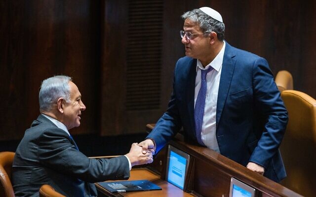 Likud leader MK Benjamin Netanyahu (left) with Otzma Yehudit party chief MK Itamar Ben Gvir at the Knesset on December 28, 2022. (Olivier Fitoussi/ Flash90)