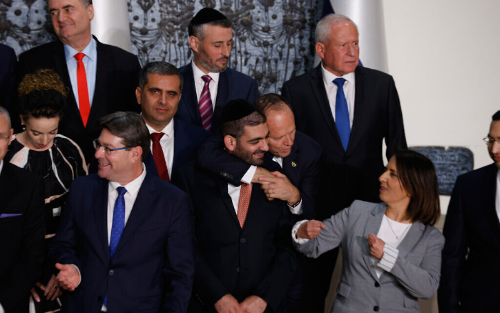 Members of the new government gather for a family photo at the President's Residence in Jerusalem, on December 29, 2022. (Olivier Fitoussi/Flash90)