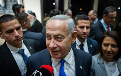 Israeli Prime Minister Benjamin Netanyahu seen after a group picture of the new government at the president's residence in Jerusalem, December 29, 2022. (Yonatan Sindel/Flash90)