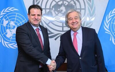 Hadash-Ta'al chairman MK Ayman Odeh, left, meets with UN Secretary-General Antonio Guterres on Friday, Dec. 9, 2022, at the UN headquarters in New York. (Courtesy)