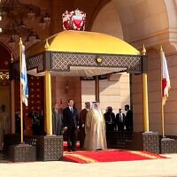 President Isaac Herzog (front L) and King Hamad bin Isa Al Khalifa (front R) at the Al Qudaibiya palace in Manama, December 4, 2022. (Lazar Berman/Times of Israel)
