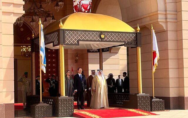 President Isaac Herzog (front L) and King Hamad bin Isa Al Khalifa (front R) at the Al Qudaibiya palace in Manama, December 4, 2022 (Lazar Berman/Times of Israel)