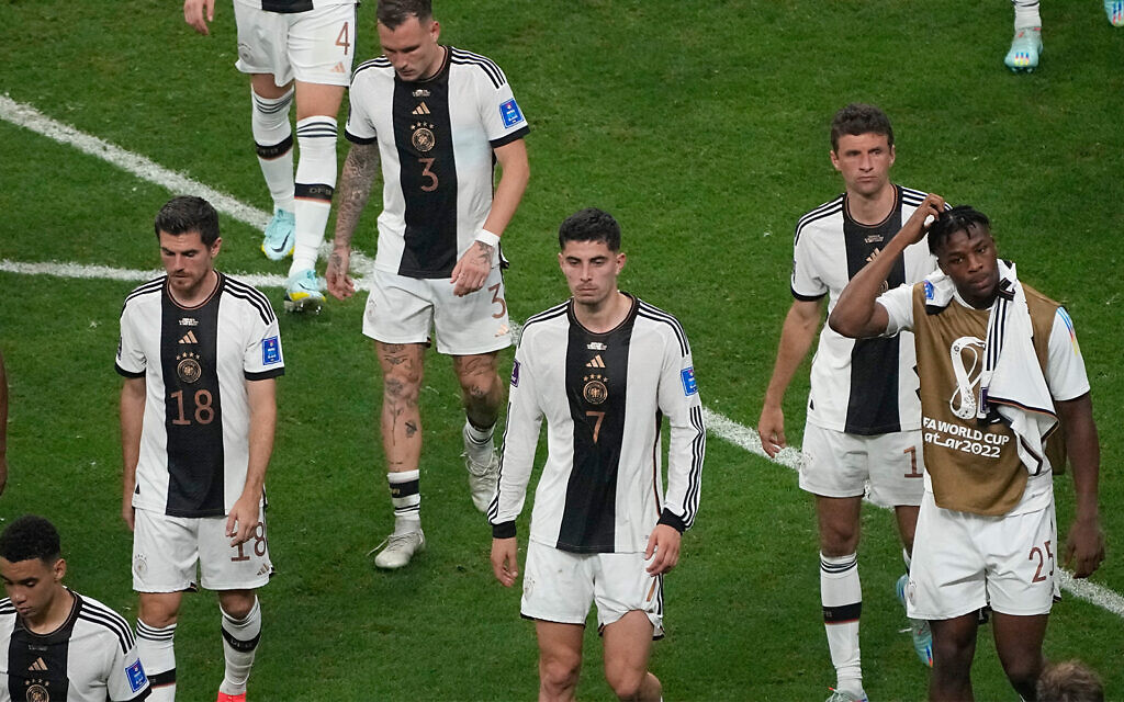 Germany knocked out of World Cup after Japan beats Spain in stunning