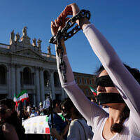 Illustrative: People protest against the Iranian regime in Rome, October 29, 2022. (AP Photo/Gregorio Borgia)