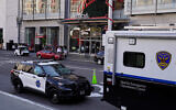 Police vehicles are stationed at Union Square following recent robberies in San Francisco on December 2, 2021. (AP Photo/Eric Risberg, File)