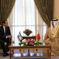 President Isaac Herzog (L) meets with Bahrain's King Hamad bin Isa Al Khalifa (R) at the Al-Qudaibiya Palace in Manama, Bahrain, December 4, 2022. (Amos Ben-Gershom/GPO)