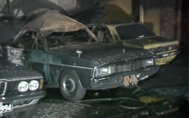 Damage seen to cars after a car bomb went off in the basement of the Hakoah Club in Bondi, Australia, on December 23, 1982, in an attack believed to have targeted Australia's Jewish community. (YouTube/Screenshot: Used in accordance with Clause 27a of the Copyright Law)