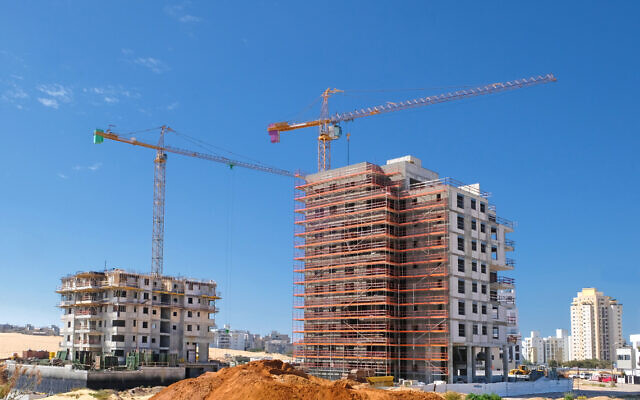 Building construction in Holon, May 2020. (100 via iStock by Getty Images)