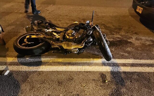 This handout photo shows a motorcycle involved in a deadly crash at the Almog Junction in the West Bank on December 1, 2022. (Magen David Adom)