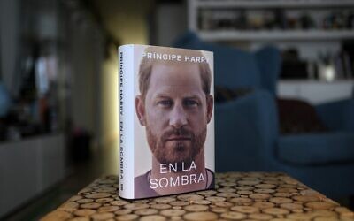 A copy of the "En la sombra" (In the shadow) Spanish version of Britain's Prince Harry's autobiography "Spare" is pictured at a reader's home in Madrid on January 5, 2023, despite the publication date set at January 10 with stringent measures in place. (Oscar Del Pozo/AFP)