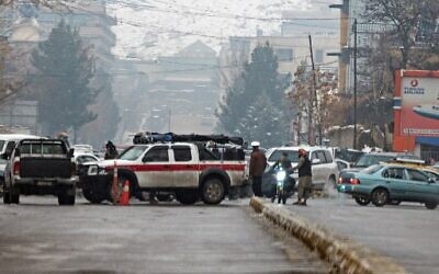 Taliban security forces block a road after a suicide blast near Afghanistan's foreign ministry at the Zanbaq Square in Kabul on January 11, 2023. (Wakil KOHSAR / AFP)