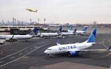 Illustrative: a United Airlines plane taxis at Newark International Airport, in Newark, New Jersey, on January 11 2023. (Ket Betancur/AFP)