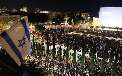 Israelis protest against Prime Minister Benjamin Netanyahu's government, in Tel Aviv, on January 14, 2023. (Jack Guez/AFP)