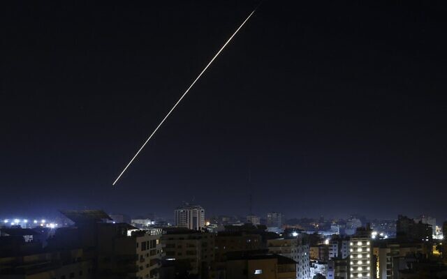 A long exposure shows a light trail from a projectile fired from Gaza City at Israel as the IDF launched air strikes on the Hamas-run Palestinian enclave early on January 27, 2023. (Mohammed Abed / AFP)