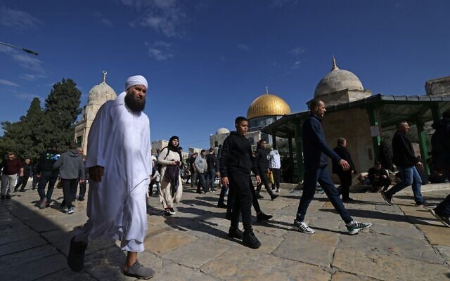 Palestinians gather in the Al-Aqsa Mosque compound on the Temple Mount before the Friday noon prayer in Jerusalem on January 27, 2023. (AHMAD GHARABLI/AFP)