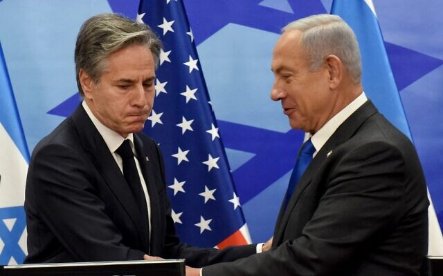 US Secretary of State Antony Blinken (left) shakes hands with Prime Minister Benjamin Netanyahu, during a press conference in Jerusalem on January 30, 2023. (Debbie HIll/Pool/AFP)