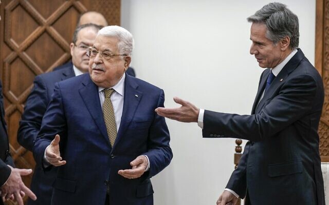 Palestinian Authority President Mahoud Abbas (L) welcomes US Secretary of State Antony Blinken to the West Bank city of Ramallah on January 31, 2023. (Majdi Mohammed/Pool/AFP)