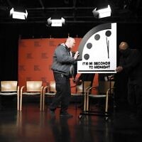 The 2023 Doomsday Clock is moved, ahead of a live-streamed event with members of the Bulletin of the Atomic Scientists, on January 24, 2023 in Washington, DC. (Anna Moneymaker / GETTY IMAGES NORTH AMERICA / Getty Images via AFP)