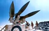 Image shows US Hawk anti-aircraft missiles in a Saudi Arabian desert, 1991. (AP Photo)