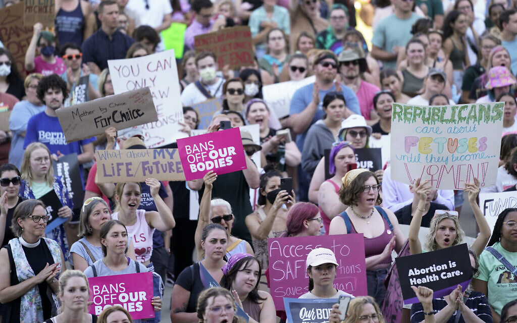 Abortion rights protesters attend a rally outside the state Capitol in Lansing, Michigan, on June 24, 2022, following the United States Supreme Court's decision to overturn Roe v. Wade. (AP Photo/Paul Sancya, File)