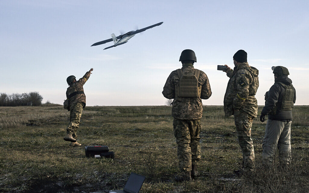 Ukrainian soldiers launch a drone at Russian positions near Bakhmut, Donetsk region, Ukraine, December 15, 2022. (LIBKOS/AP)