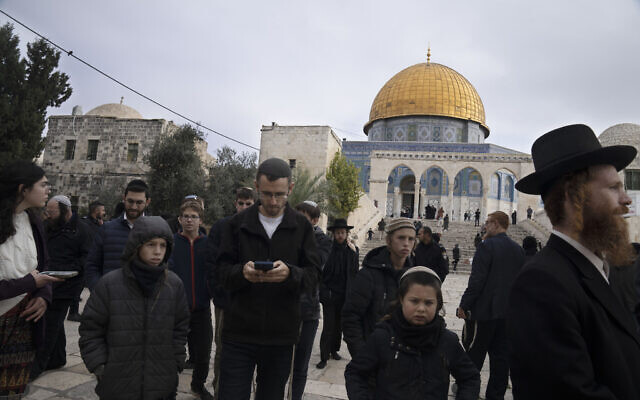 Jewish worshippers visit the Temple Mount at Al-Aqsa Mosque compound, known to Muslims as the Noble Sanctuary, in the Old City of Jerusalem, Tuesday, Jan. 3, 2023. (AP Photo/Maya Alleruzzo)