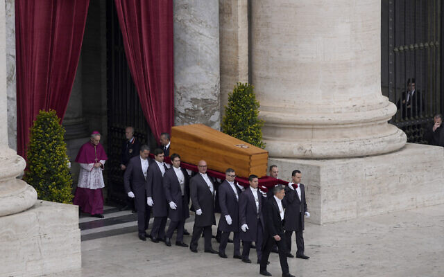 The coffin of late Pope Emeritus Benedict XVI is brought to St. Peter's Square for a funeral mass at the Vatican, January 5, 2023. (Ben Curtis/AP)