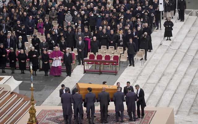 The coffin of late Pope Emeritus Benedict XVI is brought to St. Peter's Square for a funeral mass at the Vatican, January 5, 2023. (Ben Curtis/AP)