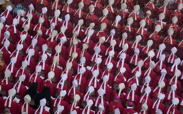 Members of the church attend the funeral mass for late Pope Emeritus Benedict XVI in St. Peter's Square at the Vatican, January 5, 2023. (Ben Curtis/AP)