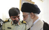 In this undated photo released January 7, 2023, Iran's Supreme Leader Ayatollah Ali Khamenei (right) speaks with Gen. Ahmad Reza Radan, the newly appointed police chief of Iran. (Office of the Iranian Supreme Leader via AP)