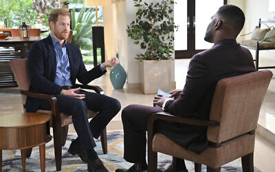 This image released by ABC shows Prince Harry, left, during an interview with "Good Morning America" co-host Michael Strahan in Los Angeles on Jan. 3, 2023, to promote his memoir "Spare." (Richard Harbaugh/ABC via AP)